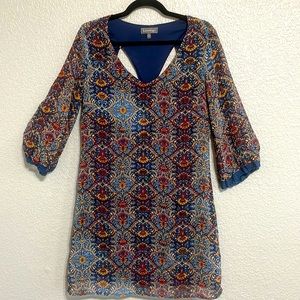 Luxology pattern size 6 dress. Three quarter length sleeves. Cut out in back